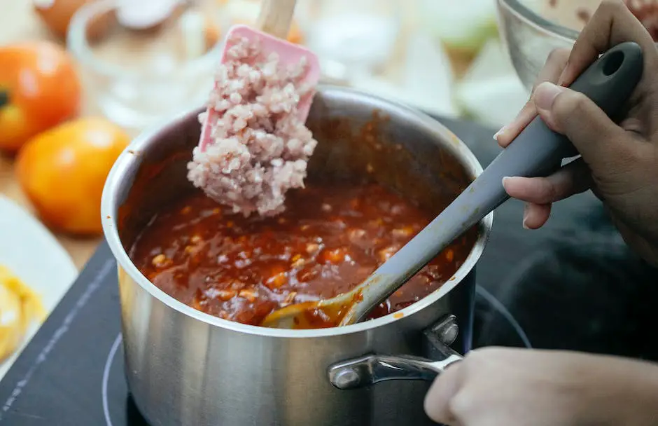 A picture of different savory dishes with applesauce that includes a meatloaf, ribs, and a stew.