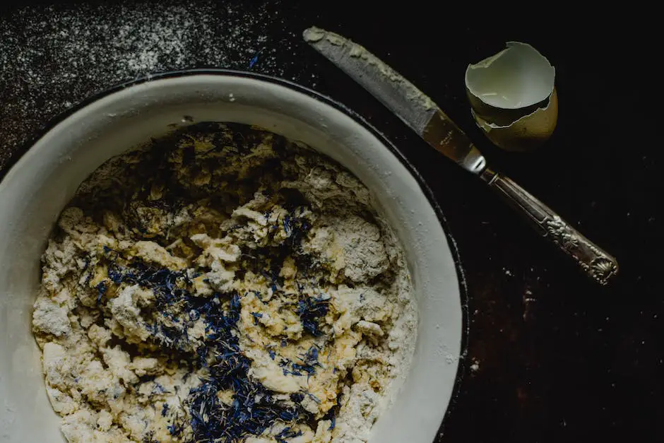 A bowl of vegan chocolate chip cookie dough with a spatula.